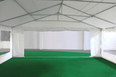 Porte de 4,50m sur un des pignons de notre tente de réception événementielle de 6x10m